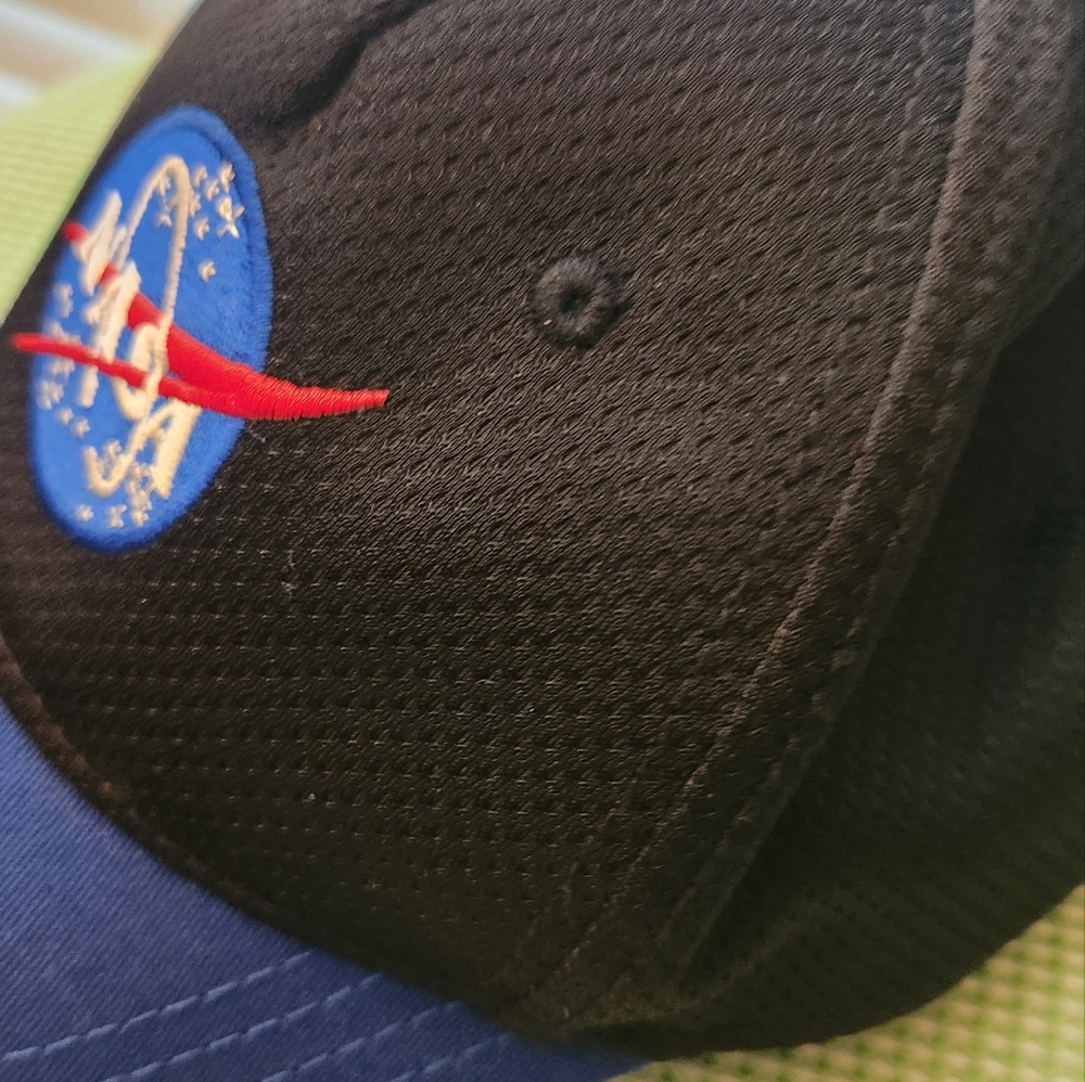 Caps NASA good condition look new.